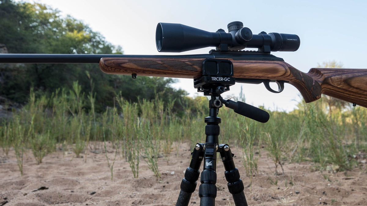 Tricer GC clamp mounted on a hunting rifle and shooting tripod